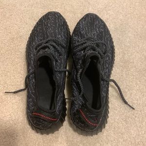 Boost brand black sneakers.